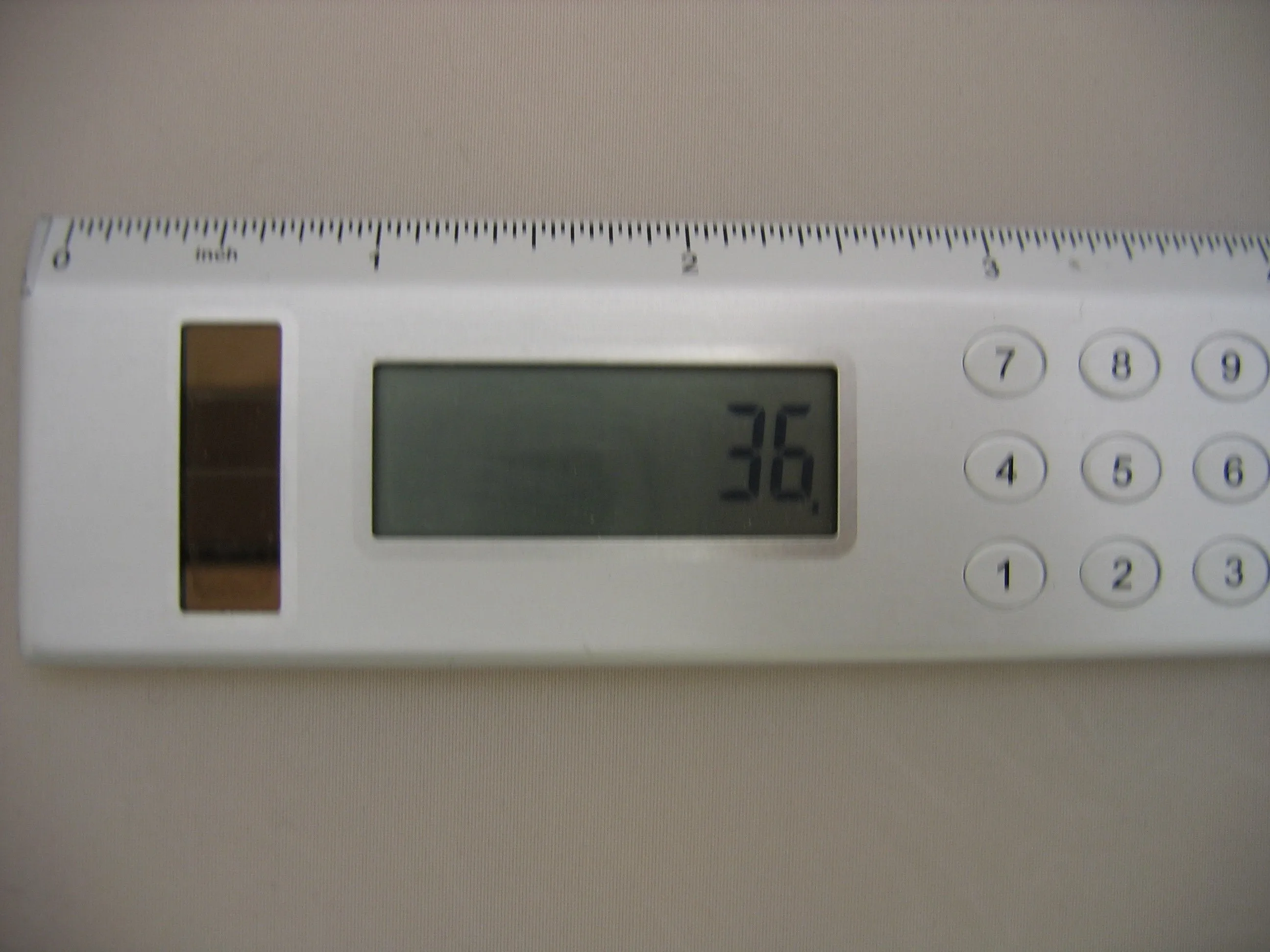 Solar Powered Calculator and 8 inch Ruler